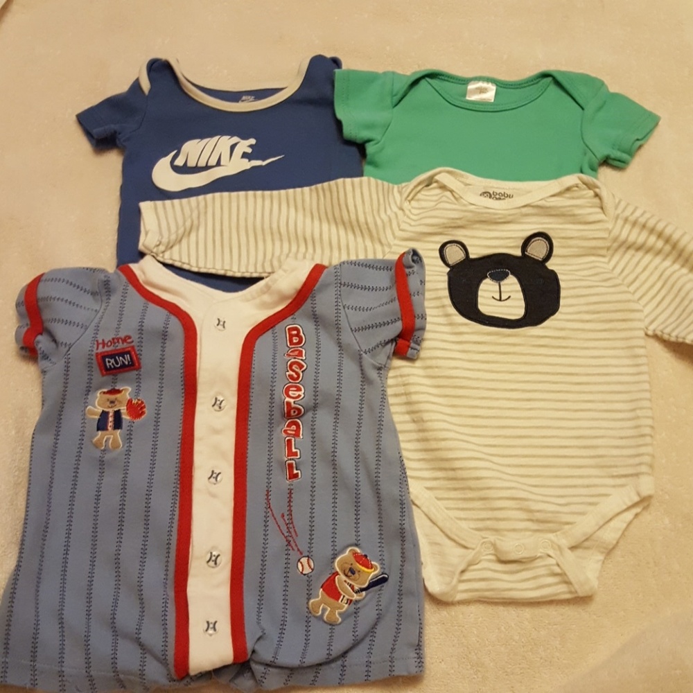 Bundle of 4 onesies. 6-9 months